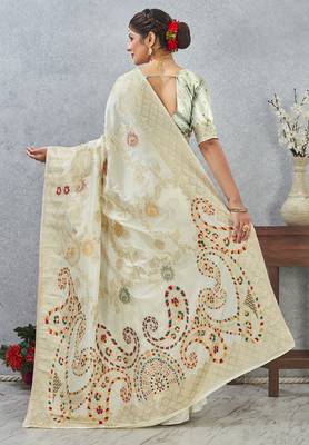 designer off white zari weaving tassel pallu work silk blend saree 2