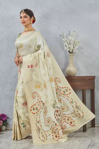 designer off white zari weaving tassel pallu work silk blend saree