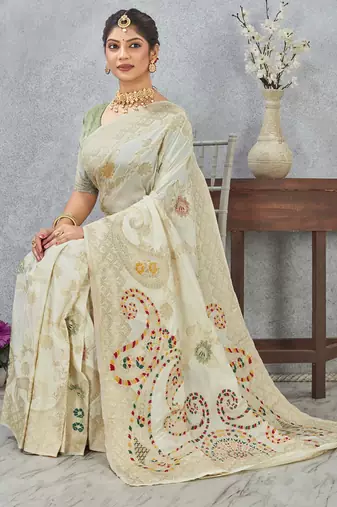 designer off white zari weaving tassel pallu work silk blend saree