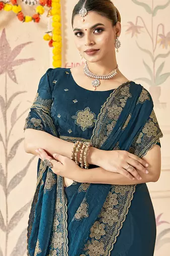 designer teal blue heavy zari embroidery silk blend party wear saree