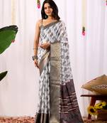 white soft lichi art silk saree with intricate ethnic motifs & rich zari woven border | designer contrast blouse
