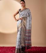 silver grey lichi art silk saree with abstract floral prints & zari woven border | designer festive & party wear