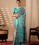 Turquoise green lichi silk saree with abstract & floral digital print and rich zari woven border with designer blouse