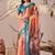 peach linen cotton saree with elegant digital floral & leaf print and patola style contrast border with matching blouse
