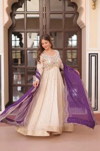 Off-white jacquard gown with purple dupatta