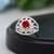 Red color american diamond ring