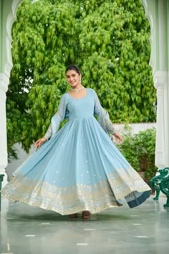 Sky blue designer dusty-tone faux georgette gown with embroidery & sequins dupatta