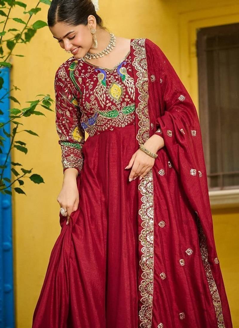 Red vichitra fabric gown with multi-thread & zari embroidery     12 kali stitch, full sleeves