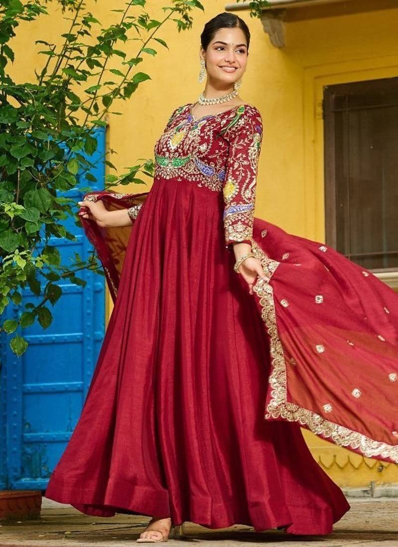 Red vichitra fabric gown with multi-thread & zari embroidery     12 kali stitch, full sleeves