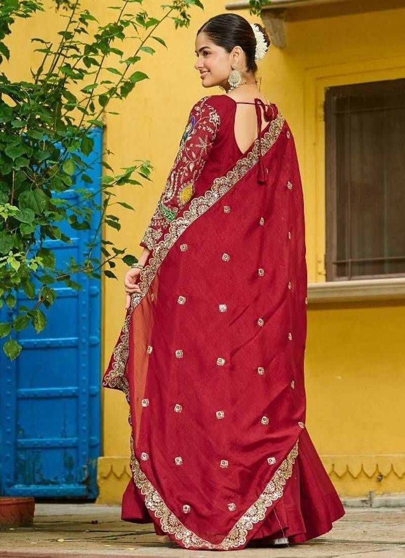 Red vichitra fabric gown with multi-thread & zari embroidery     12 kali stitch, full sleeves