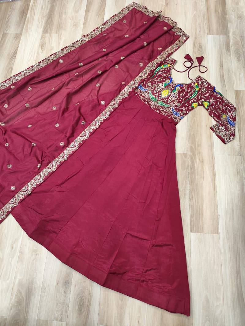 Red vichitra fabric gown with multi-thread & zari embroidery     12 kali stitch, full sleeves