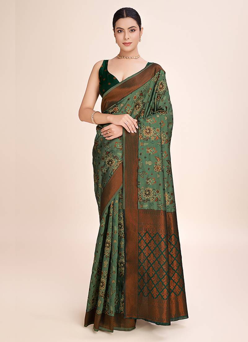 sea green banarasi silk blend saree with zari weaving detailing