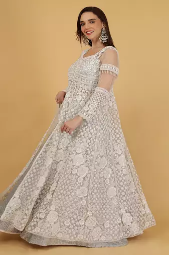 white and silver lehenga set with jacket