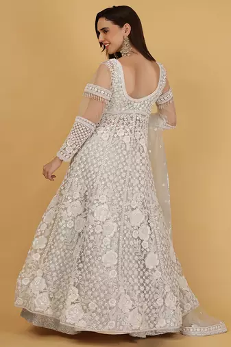 white and silver lehenga set with jacket