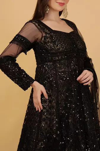black jacket and antique gold lehenga set