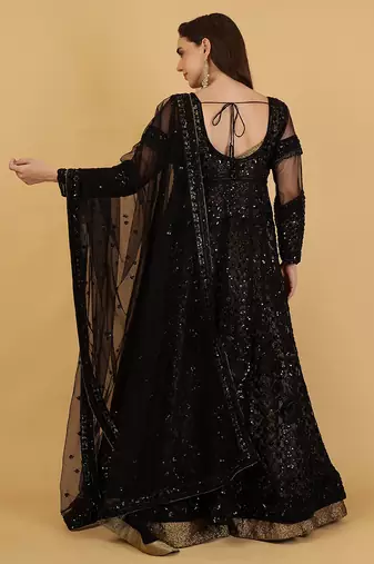 black jacket and antique gold lehenga set