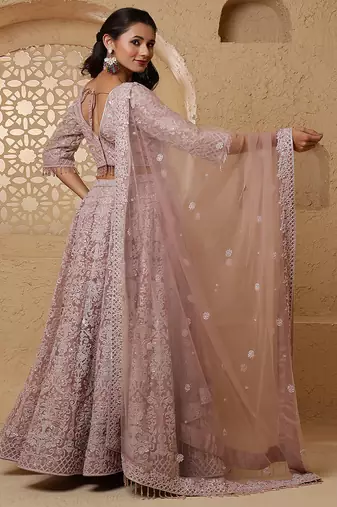 dull pink net lehenga set with with blouse and dupatta