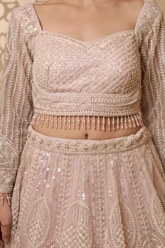 baby pink net lehenga set with blouse and dupatta