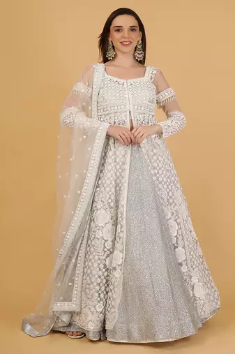 white and silver lehenga set with jacket