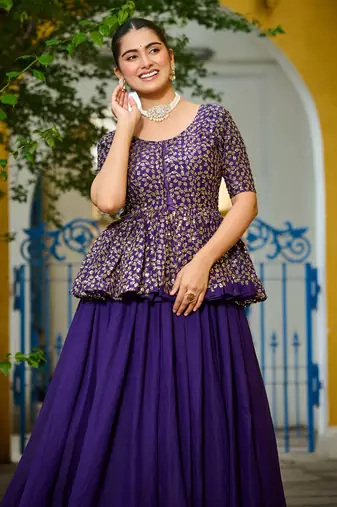 purple silk embroidered peplum top with lehenga
