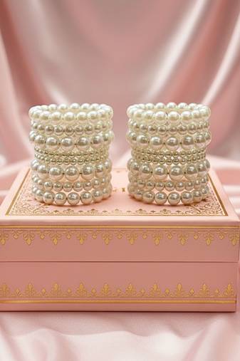 Layered adjustable aaa pearl bracelet with rhodium-plated wire