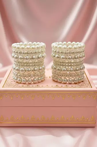 Layered adjustable aaa pearl bracelet with rhodium-plated wire