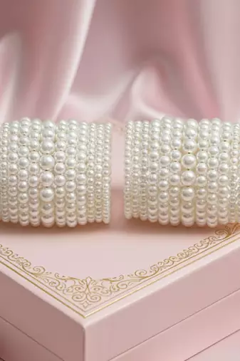 multi-layered adjustable aaa pearl bracelet with rhodium-plated wire