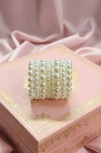 Layered adjustable aaa pearl bracelet with rhodium-plated wire