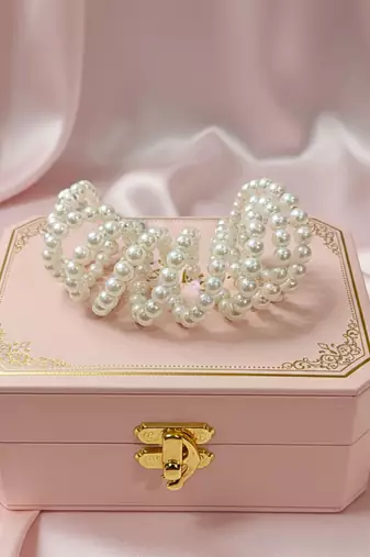 Layered adjustable aaa pearl bracelet with rhodium-plated wire