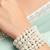 combo of two multi-layered adjustable aaa pearl bracelet with rhodium-plated wire