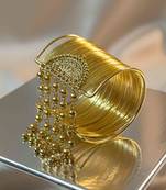 combo of two gold & silver-plated fancy hanging balls  adjustable cuff  bracelet