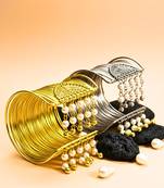 combo of two gold & silver-plated pearl hanging balls  adjustable cuff bracelets