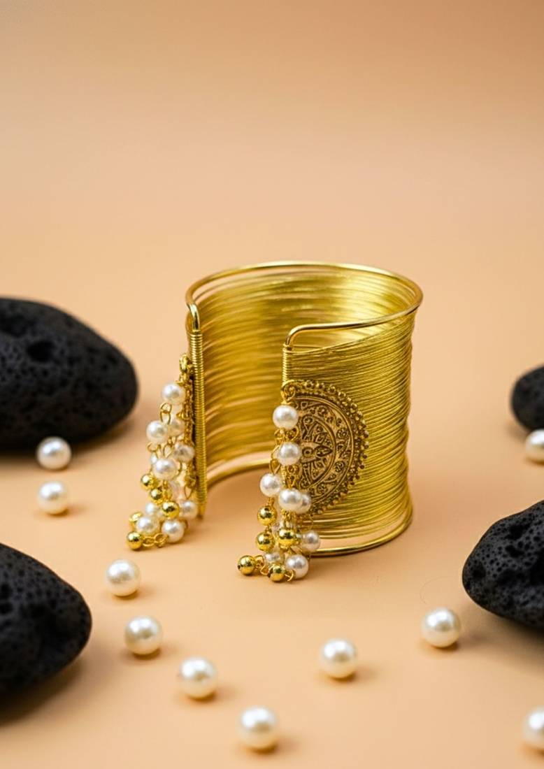 combo of two gold & silver-plated pearl hanging balls  adjustable cuff bracelets