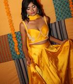 yellow embroidered satin lehenga set