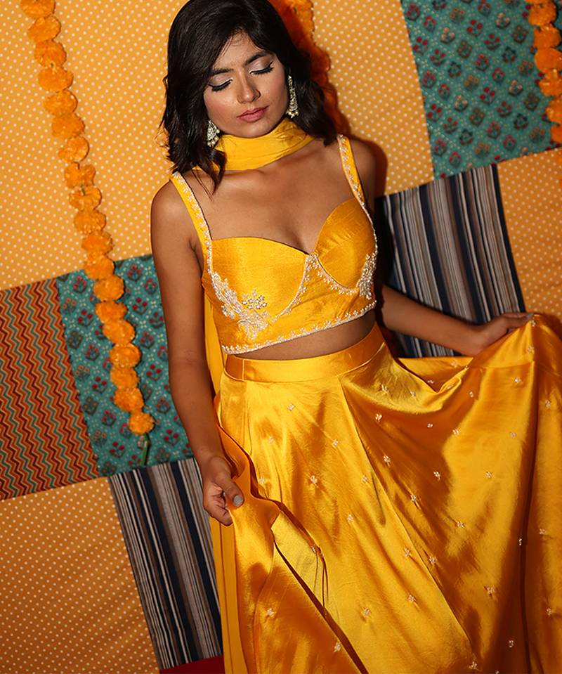 yellow embroidered satin lehenga set