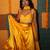 yellow embroidered satin lehenga set