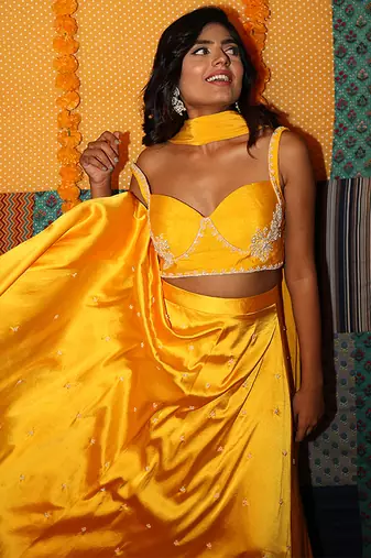 yellow embroidered satin lehenga set