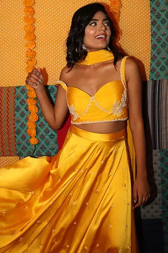 yellow embroidered satin lehenga set