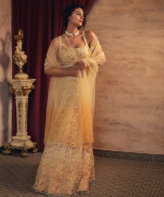 gold embroidered net lehenga set 1