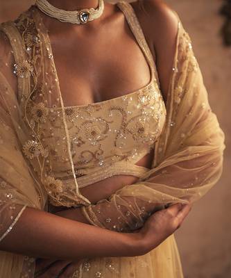 gold embroidered net lehenga set 3