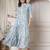 Women cotton sky blue floral print flared maxi dress