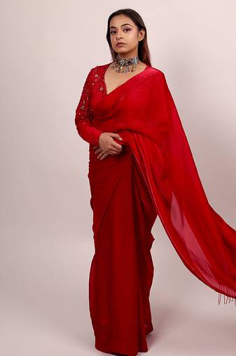 Red embroidered crepe saree