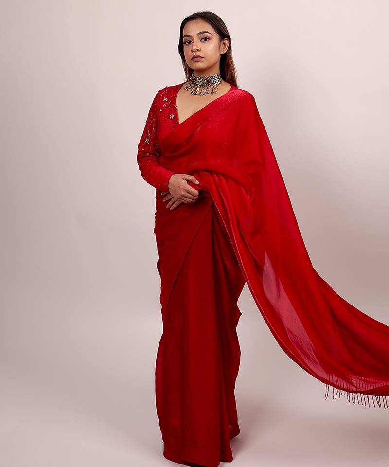 Red embroidered crepe saree