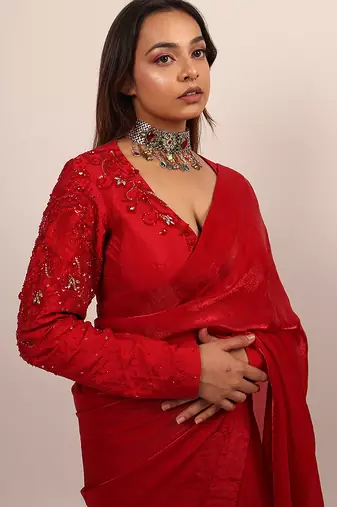 Red embroidered crepe saree