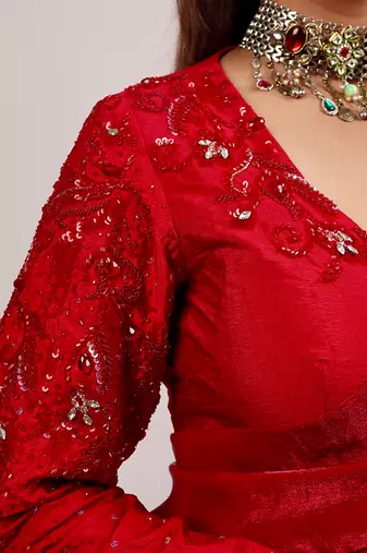Red embroidered crepe saree