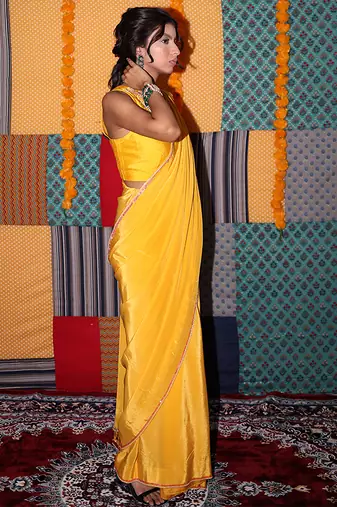Yellow embroidered crepe saree