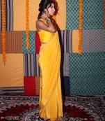 Yellow embroidered crepe saree
