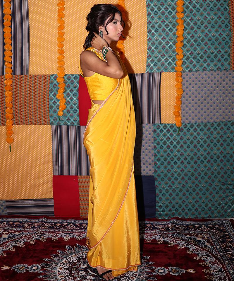Yellow embroidered crepe saree