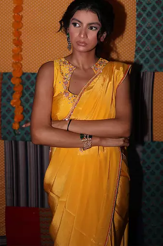 Yellow embroidered crepe saree