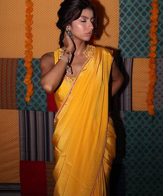 Yellow embroidered crepe saree 4